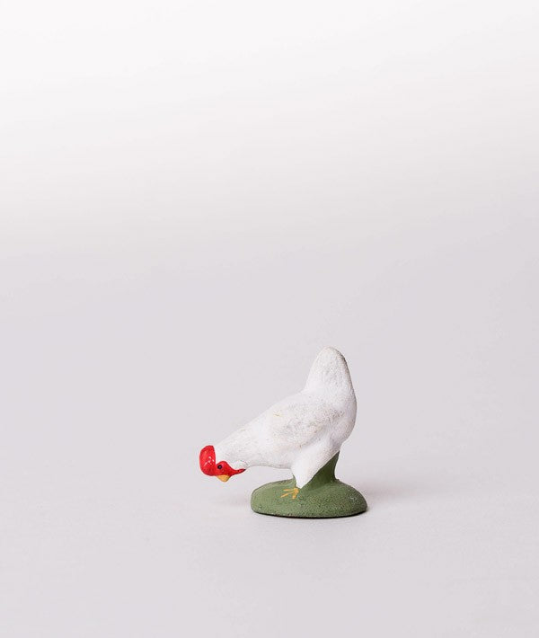 Santon la poule blanche picore