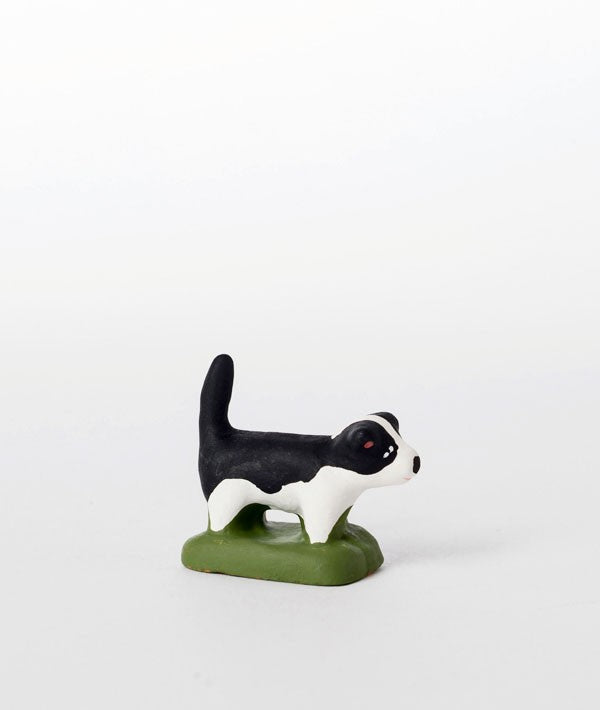 Santon le chiot noir et blanc