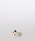 Santon le canard couché gris